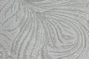 Ткань сетка: от рыбацких сетей до декора одежды